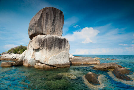 Rocks, sea and blue sky in Lipe island, Thailandの写真素材