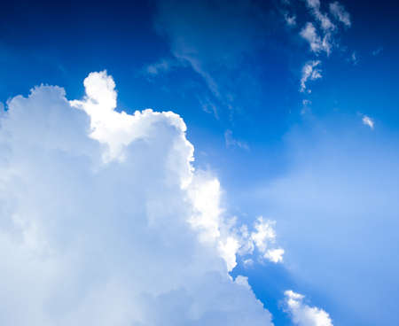 Blue sky with cloudsの写真素材