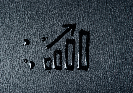 Business write growth graph on black skinの写真素材