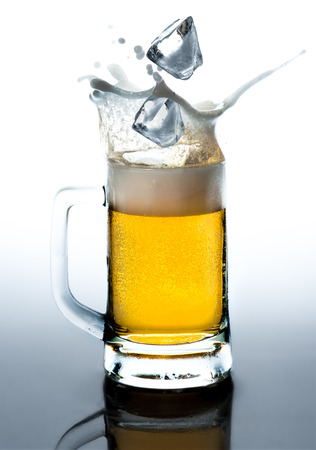 beer with ice. splashの写真素材