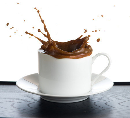 coffee splash isolated on white backgroundの写真素材