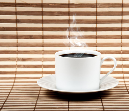 Coffee cup  on old wooden backgroundの写真素材