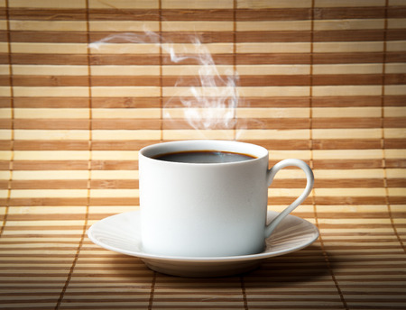 Coffee cup  on old wooden backgroundの写真素材