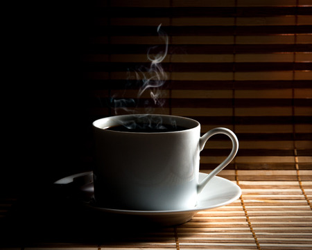 Coffee cup  on old wooden backgroundの写真素材