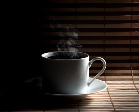Coffee cup  on old wooden backgroundの写真素材