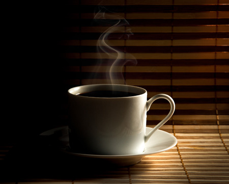 Coffee cup  on old wooden backgroundの写真素材