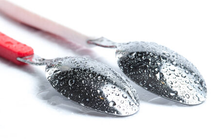 Spoons with water dropsの写真素材