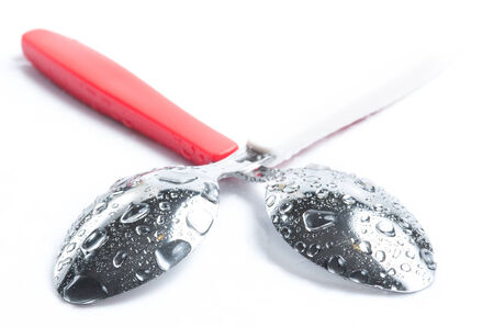 Spoons with water dropsの写真素材