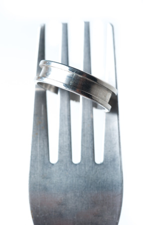 wedding rings and forkの写真素材