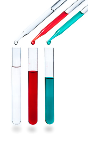 liquid dripping from pipette into test tube isolatedの写真素材