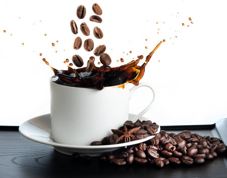 splash coffee isolated on white backgroundの写真素材