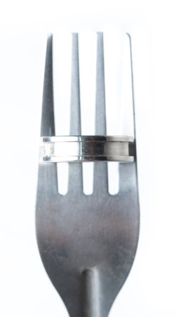 wedding rings and forkの写真素材