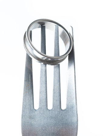 wedding rings and forkの写真素材