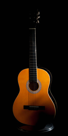 guitar in the darkの写真素材