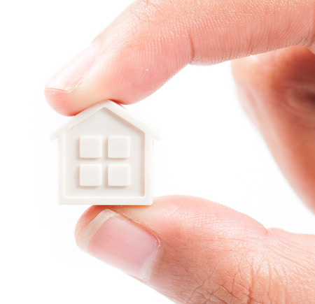 Hand holding houseの写真素材