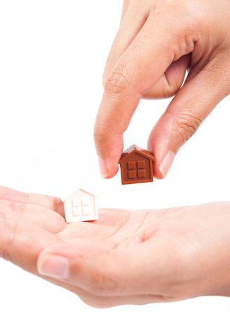 Hand holding houseの写真素材