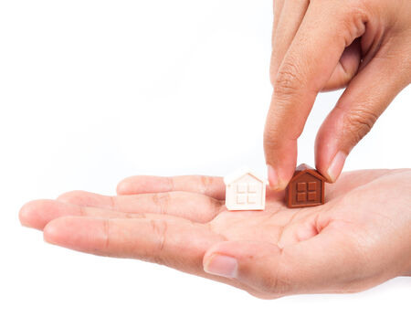 Hand holding houseの写真素材