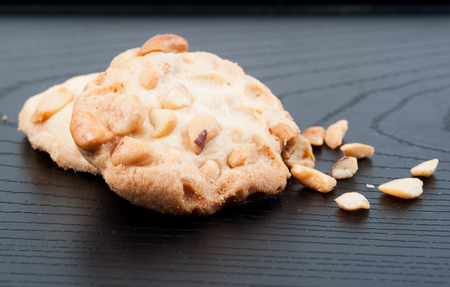 cookie on black wooden tableの写真素材