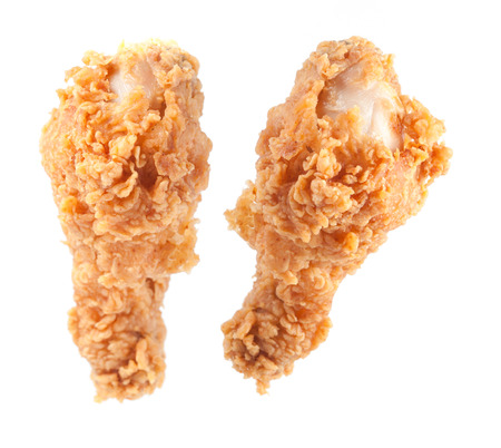 Golden brown fried chicken drumsticksの写真素材