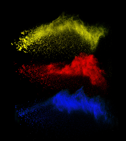 Launched colorful powder on black backgroundの写真素材