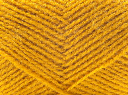 yellow yarn as a backgroundの写真素材