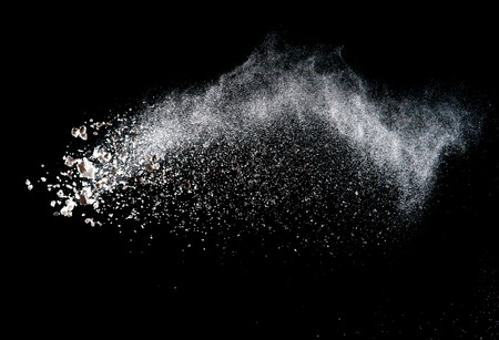 Flour on black backgroundの写真素材
