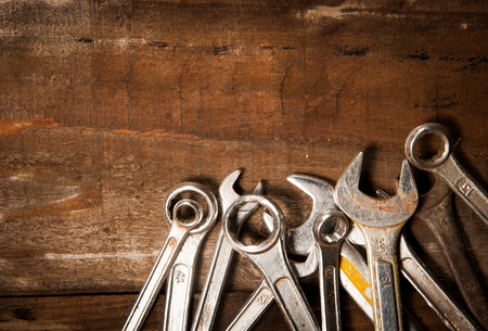 tool renovation on grunge woodの写真素材
