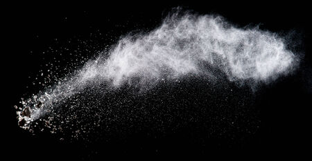 Flour on black backgroundの写真素材