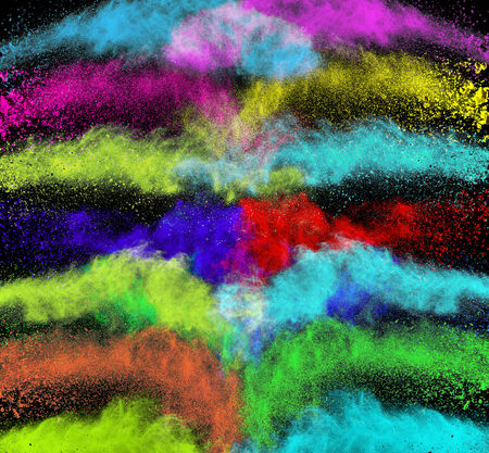 Launched colorful powder on black backgroundの写真素材