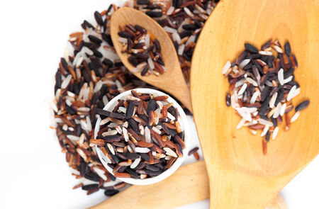 Food background with of rice variety . rice mixture. brown rice, black rice, white rice.の写真素材