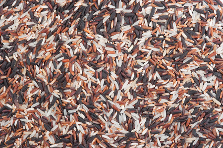 Food background with of rice variety . rice mixture. brown rice, black rice, white rice.の写真素材