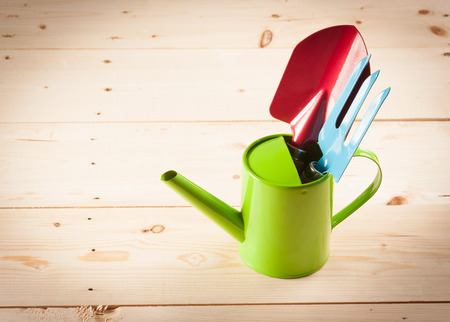 Gardening tools on wooden backgroundの写真素材