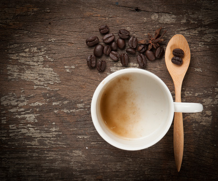 empty coffee cup on wood tableの写真素材