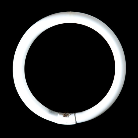 Fluorescent lamp isolated on black backgroundの写真素材