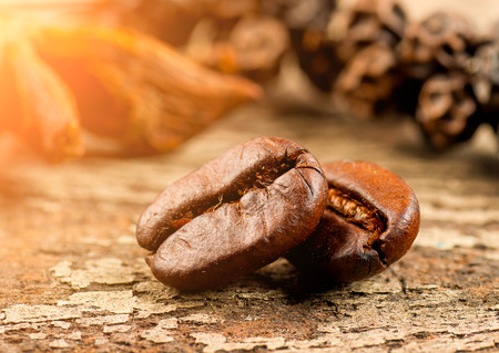 coffee grains on grunge wooden backgroundの写真素材