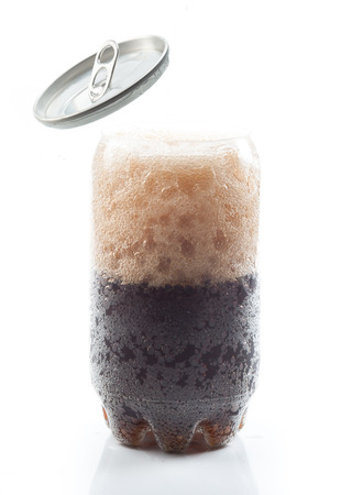 Cola drink in transparent can isolated over white backgroundの写真素材