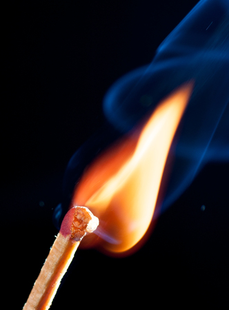 match bursting with incredible smoke cloudの写真素材