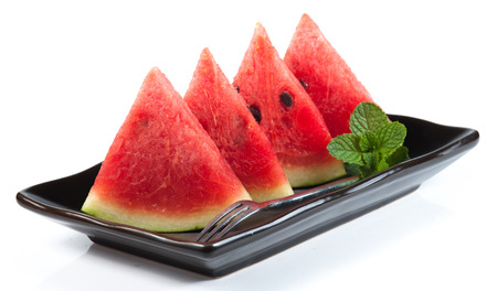 water-melon on a plate on a white backgroundの写真素材