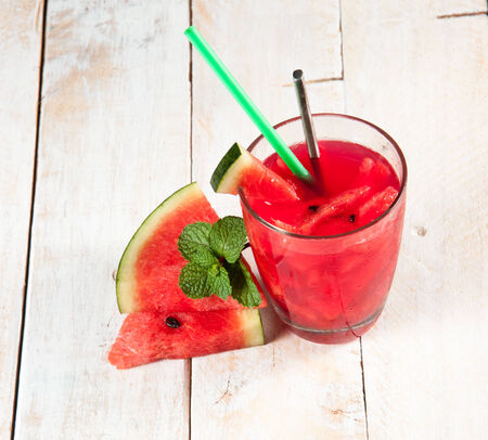 Fresh water melon drink on woodの写真素材