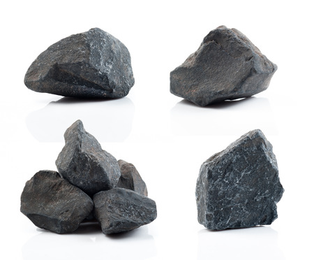 Fragment of granite on a white background.の写真素材