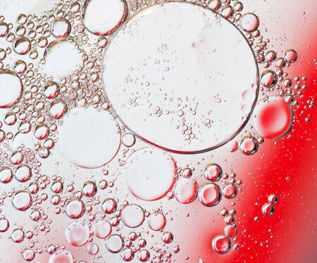 Oil drops on a water surfaceの写真素材