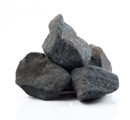 Fragment of granite on a white background.の写真素材