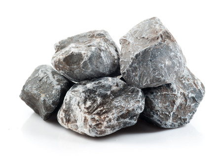 Fragment of granite on a white background.の写真素材