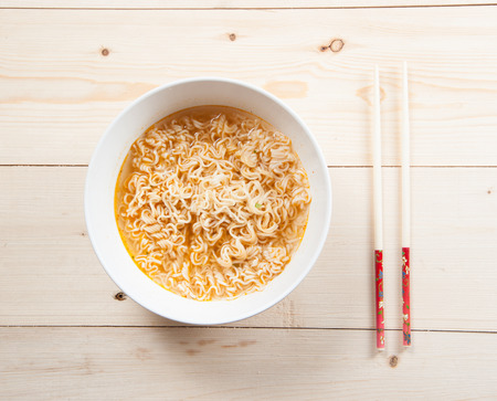 Instant noodles on wood baordの写真素材