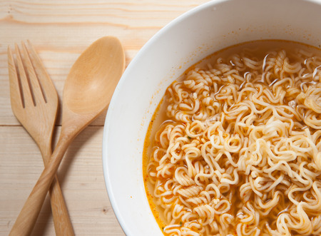 Instant noodles on wood baordの写真素材