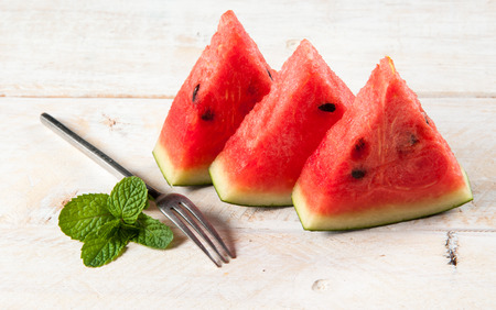 water-melon on wood backgroundの写真素材