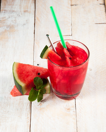 Fresh water melon drink on woodの写真素材