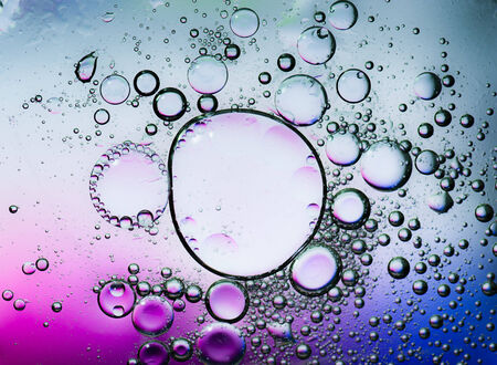 Oil drops on a water surface,purple の写真素材