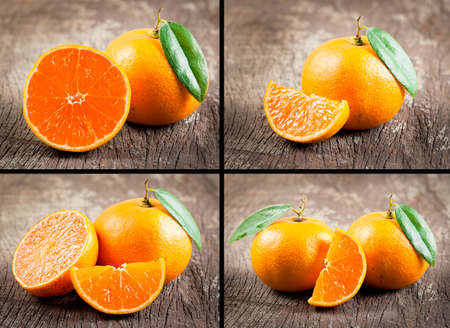 collection of Fresh oranges on wooden tableの写真素材