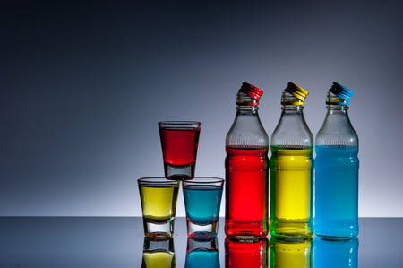 Exotic bottle alcohol cocktail and glass の写真素材